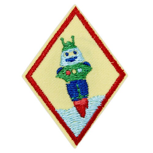 Cadette Showcasing Robots Badge